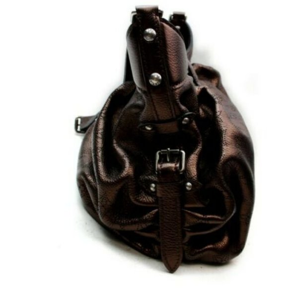 LOUIS VUITTON XS MORDRE MONOGRAM MAHINA - Picture 14 of 15